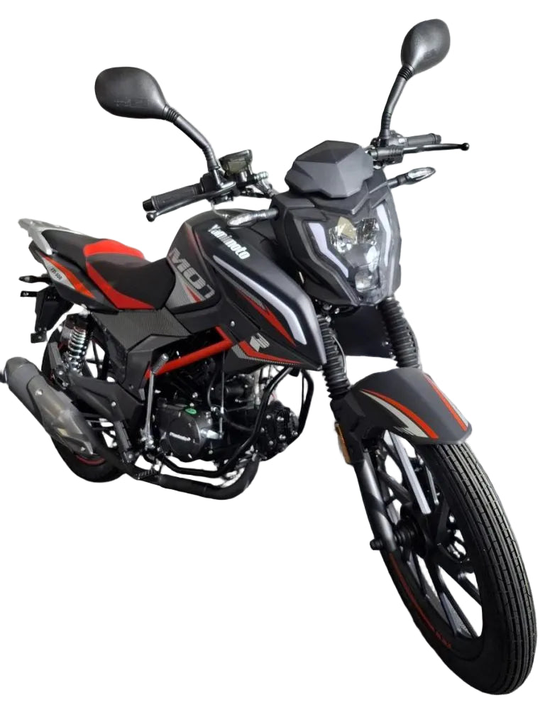 A black and red 100CC motorcycle with a single headlight, black mirrors, and a black frame, parked against a gray brick wall.