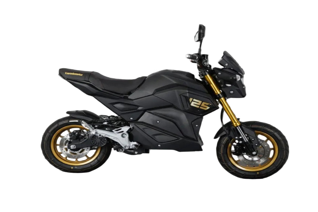 Black motorcycle with gold accents on a dark gray background