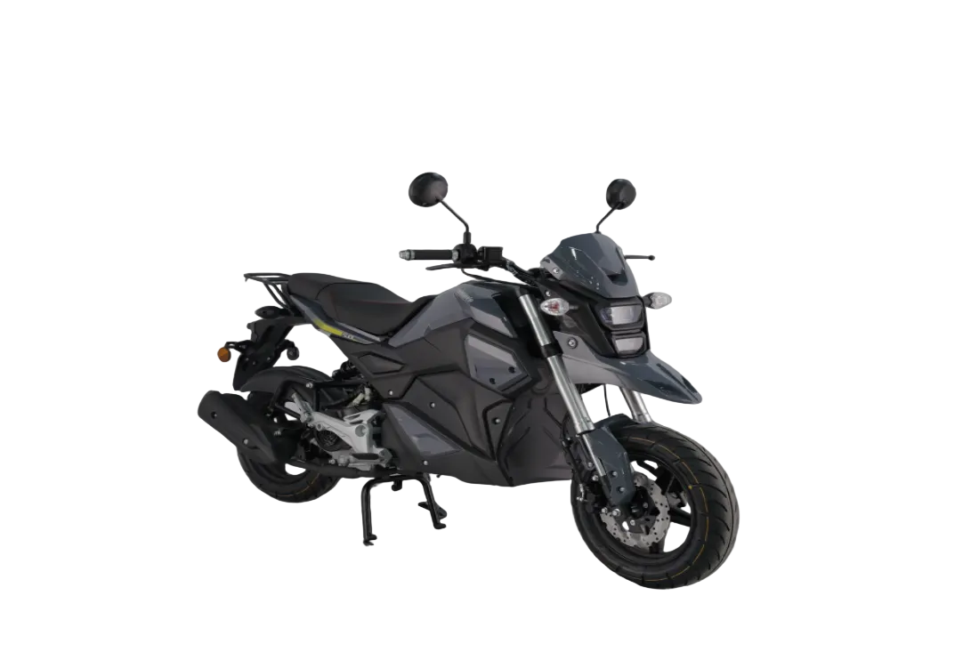A modern gray sport motorcycle with black components, shown on a reflective concrete surface with a soft, misty studio background.